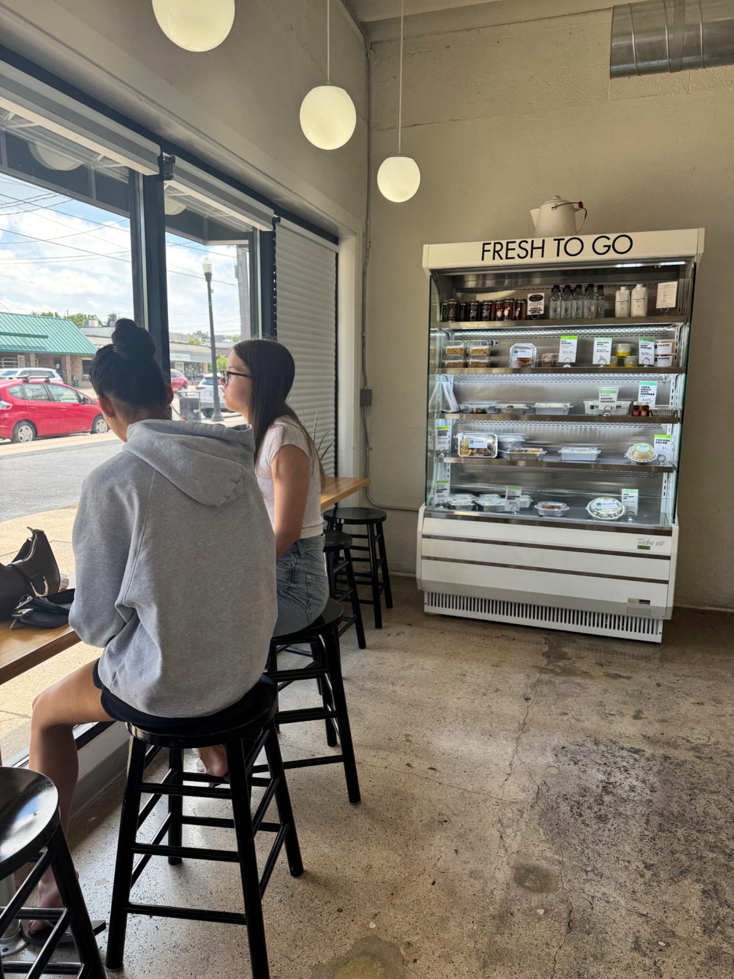 Making Thyme Kitchen fresh-to-go deli case stocked with prepared meals