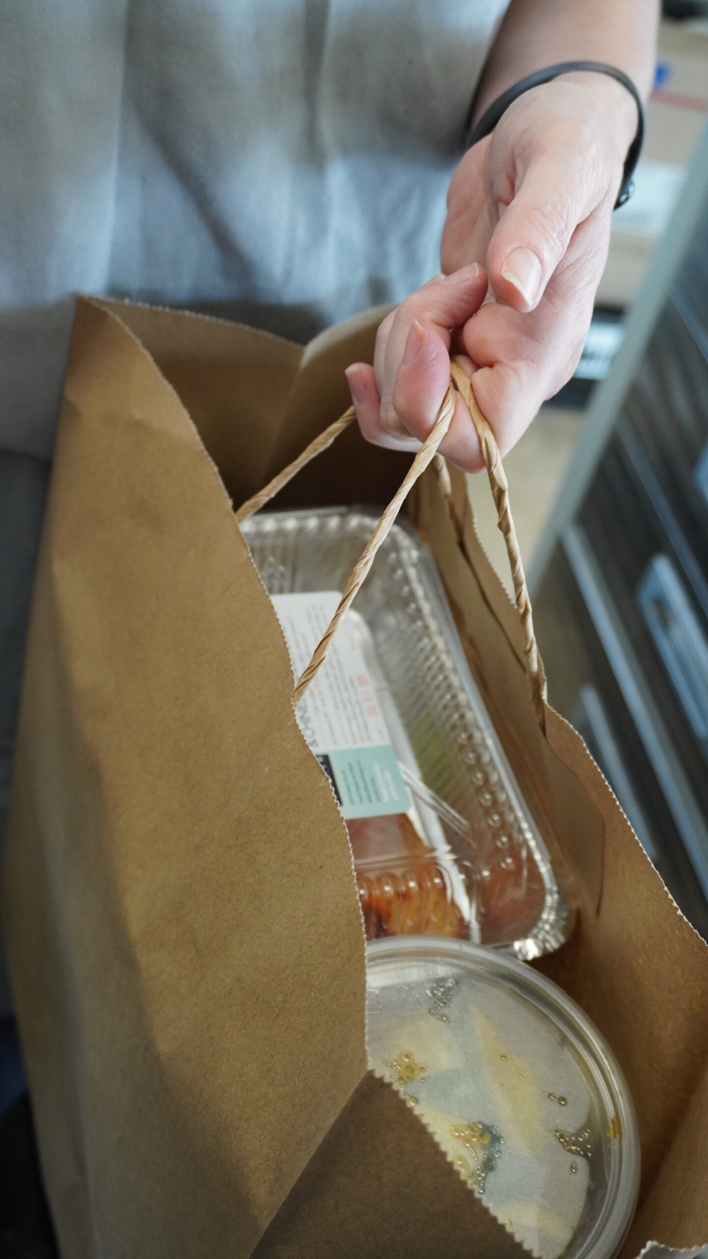 A Making Thyme Kitchen order being handed over