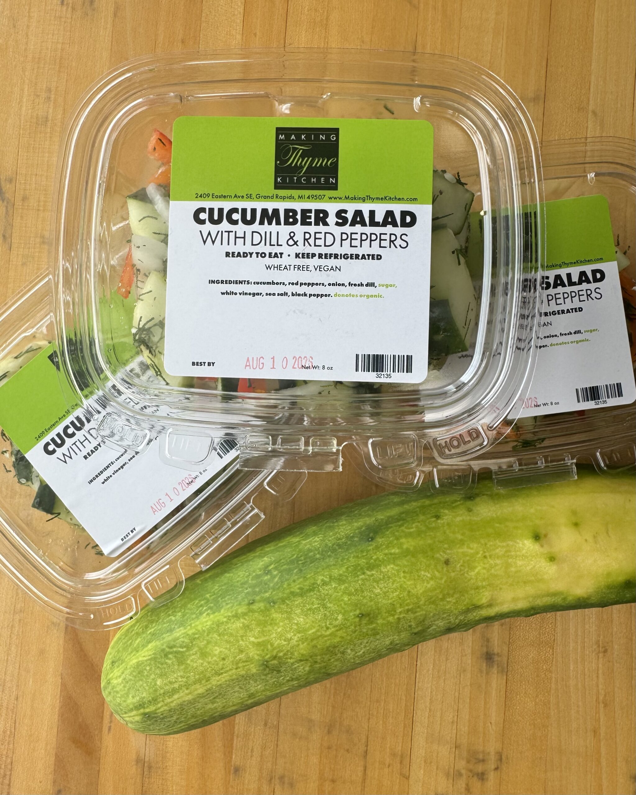 Cucumber salad with dill and red peppers, packed fresh