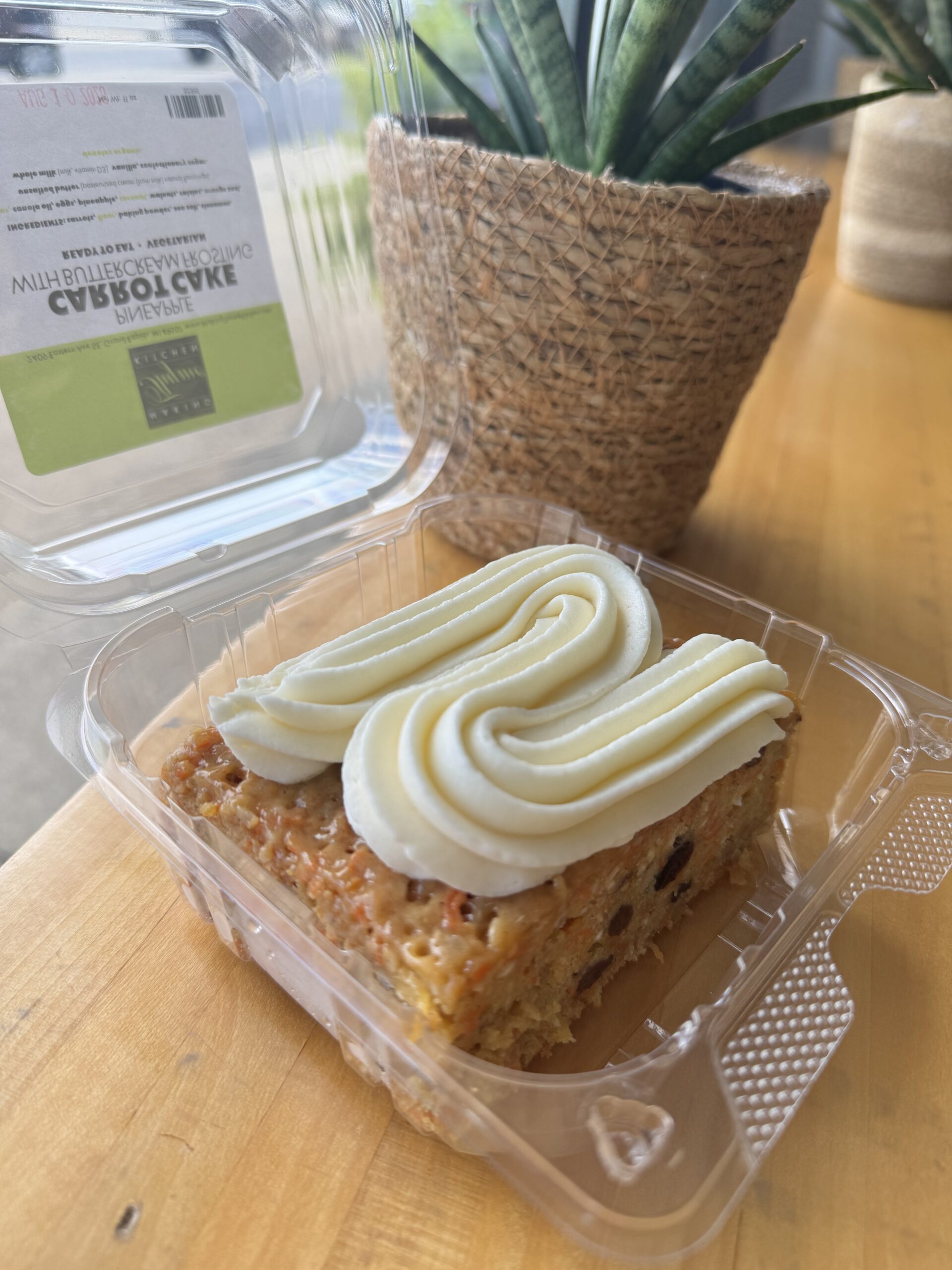 A frosted dessert bar, packed to take home